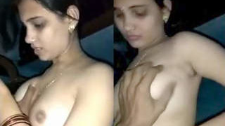 Indian woman takes off her bra