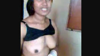 An Indian beauty flaunts her large breasts as she reveals them