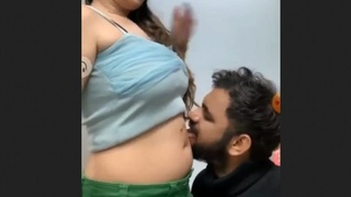 Belly button licking with curvy girlfriend in blue-green outfit