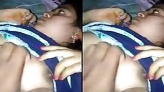 Sexy Indian girl presses her breasts and jerks her fingers
