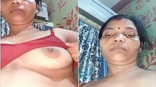 A horny Desi Bhabhi shows off her tits and pussy