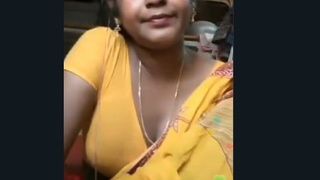 Indian wife seductively poses for camera